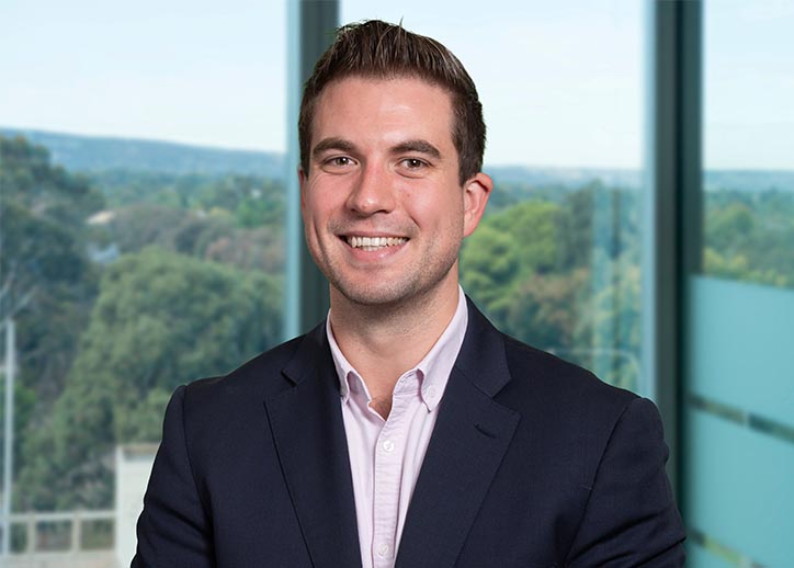 Mitchell Hilton, Audit & Assurance, smiling at the camera.