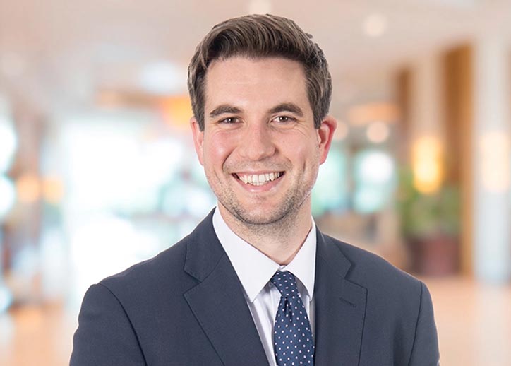 Mitchell Hilton, Audit & Assurance, smiling at the camera.