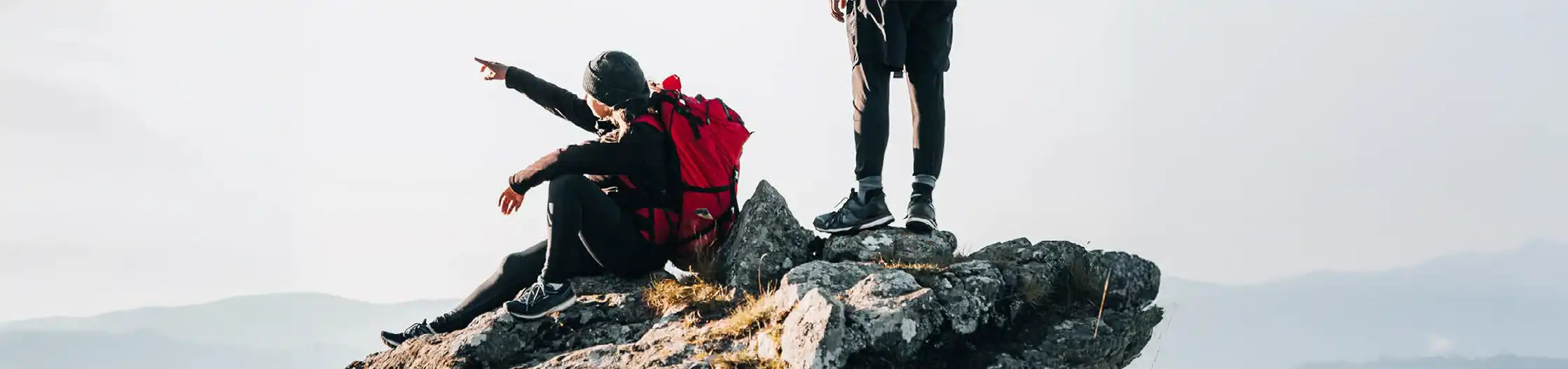 Decorative image of people sitting on mountain