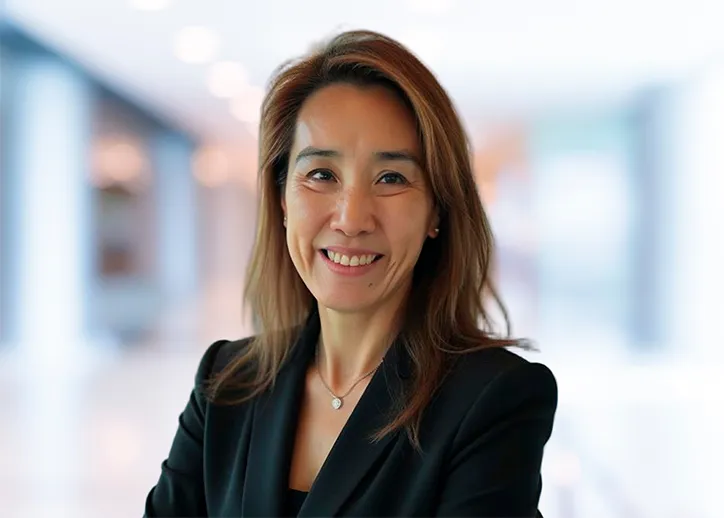 Tiffany Wong, Chief Information Officer smiling at the camera.