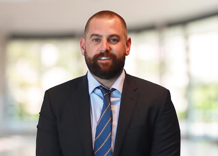 Brodie Coldwell, Associate Wealth Adviser, smiling at the camera.