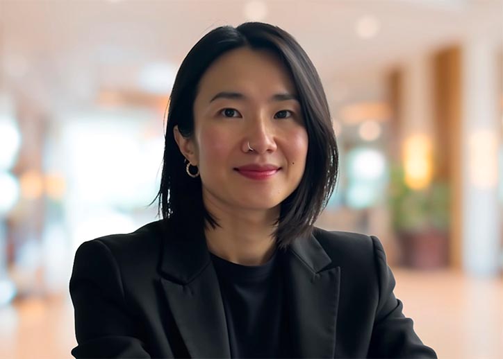 Lulu Zeng, Project & Infrastructure Advisory, smiling at the camera.