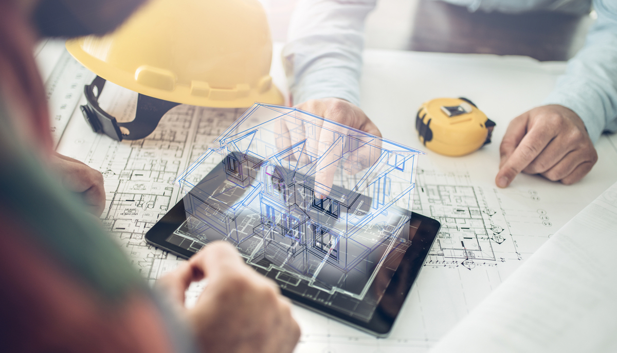 People around a table looking at blueprints
