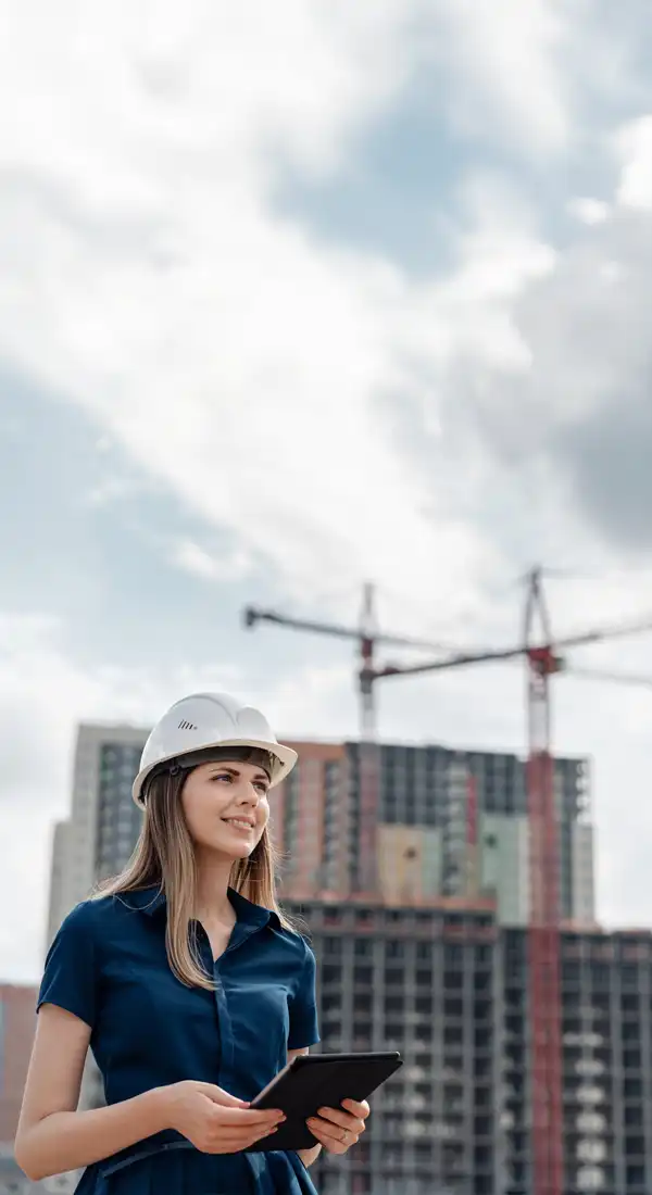 Decorative image of construction site and worker.