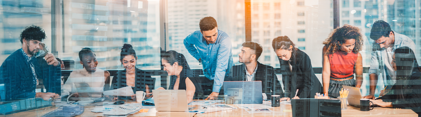 A group of professionals around a boardroom table