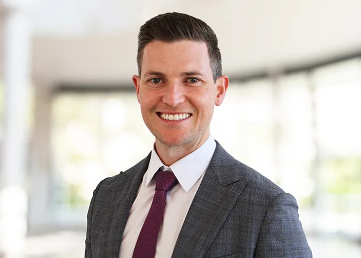 Lachlan Rasheed, CFO Advisory Director smiling at the camera.