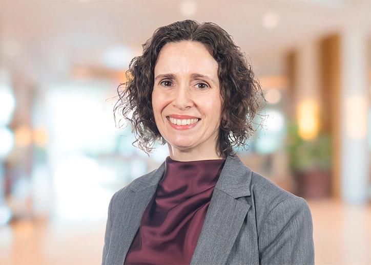 Tania Occhiuto, Risk Advisory Services, smiling at the camera.