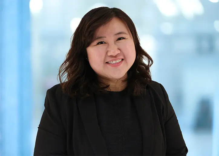 Madeline Ho smiles at the camera.