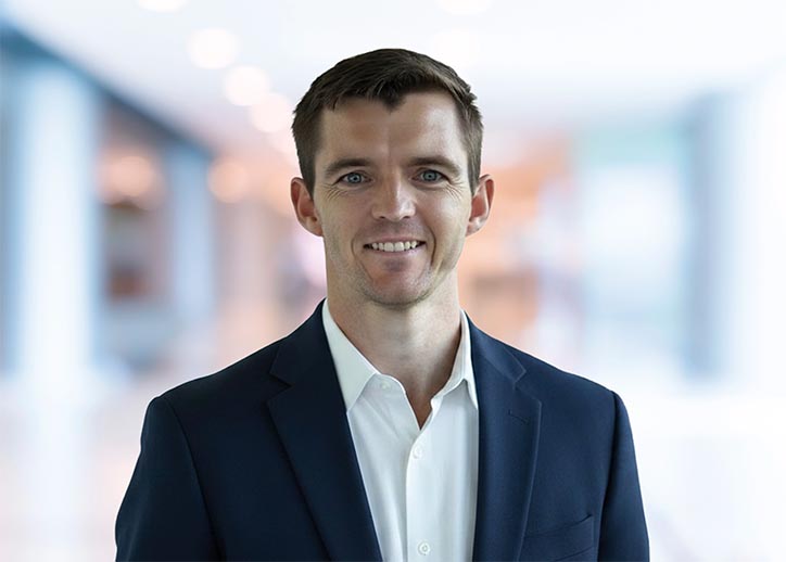David Wright, Corporate & International Tax, smiling at the camera.