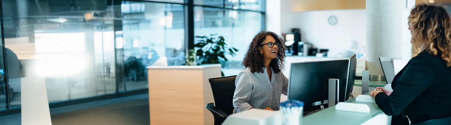 Public sector worker helps a client
