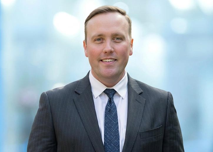 Angus Farquhar, Audit & Assurance, smiling at the camera.