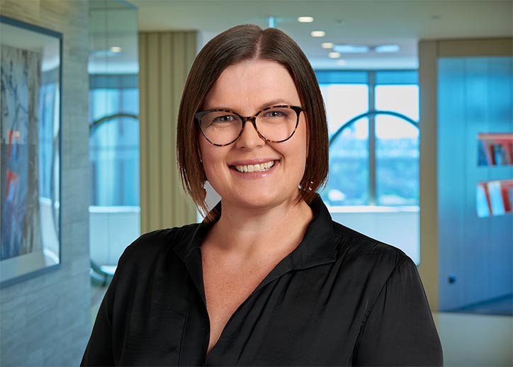 Kerry Atkinson, Chief People Officer, smiling at the camera.