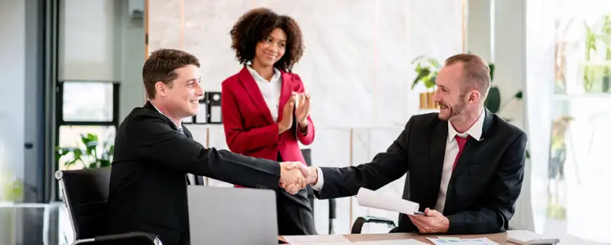 Decorative image of people in a meeting talking.