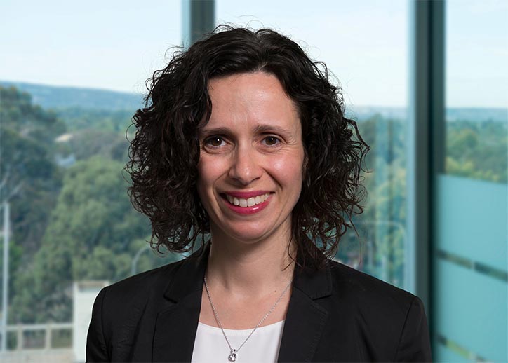 Tania Occhiuto, Risk Advisory Services, smiling at the camera.