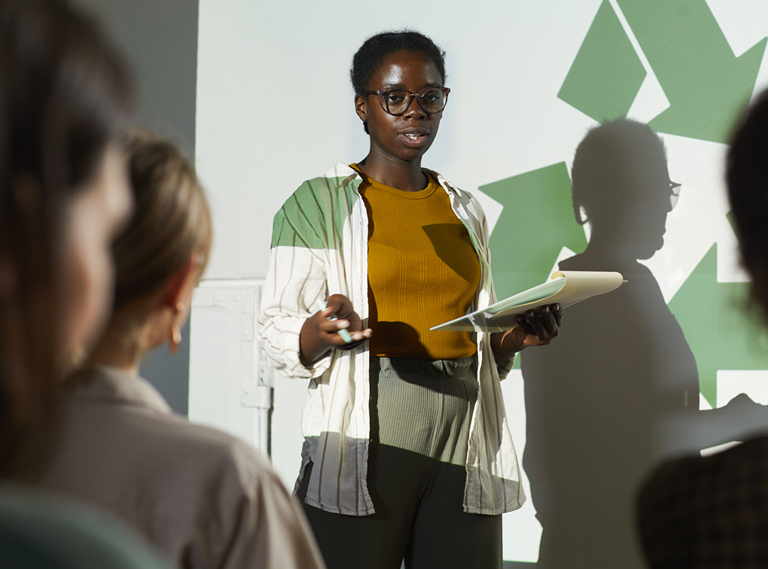 A woman presents a sustainability class
