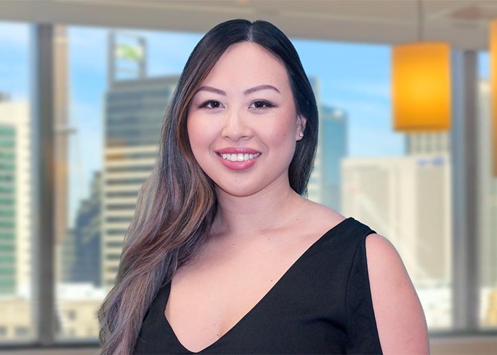 Lilian Te, corporate & international tax, smiling at the camera.