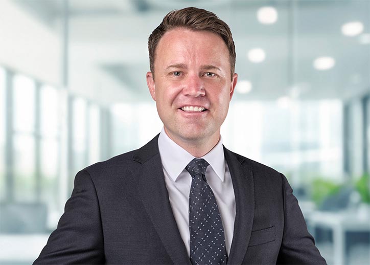 Chris Richardson, business services, smiling at the camera.