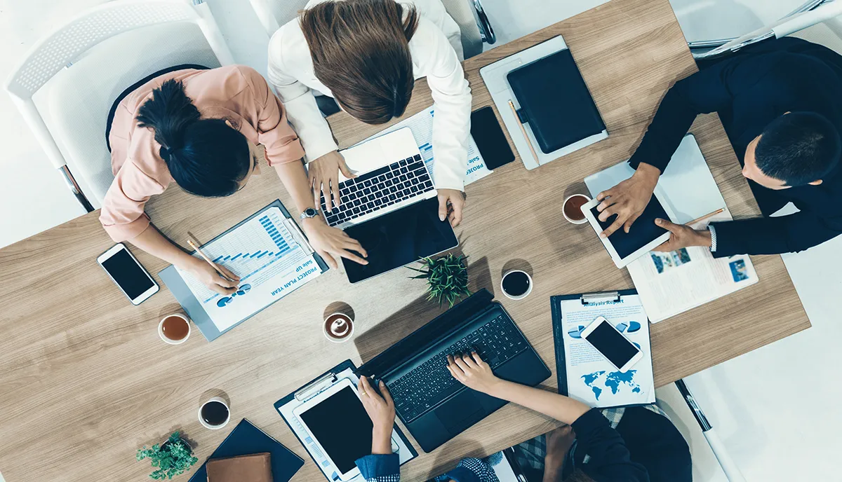 Team of four working together